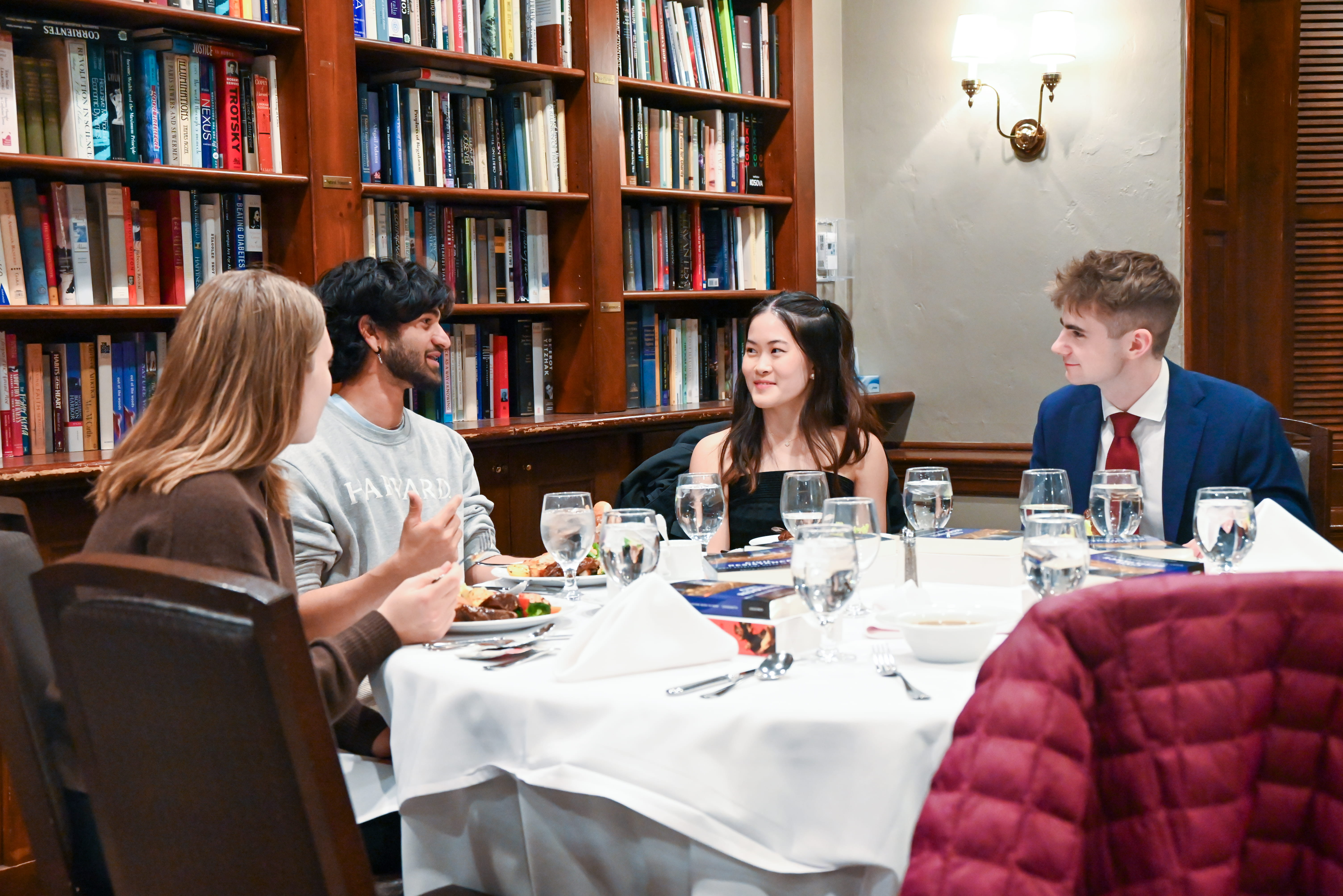 Post-faculty dialogue, students further discuss the topic over a shared meal.