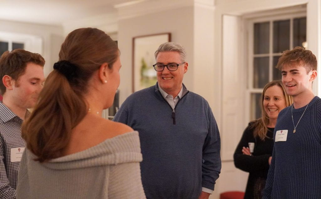 Dean of Students, Tom Dunne, and students engage in conversation around Intellectual Vitality