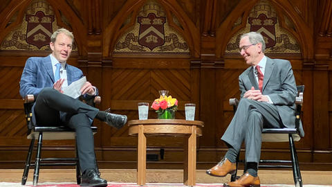 David Deming and Christopher Eisgruber.