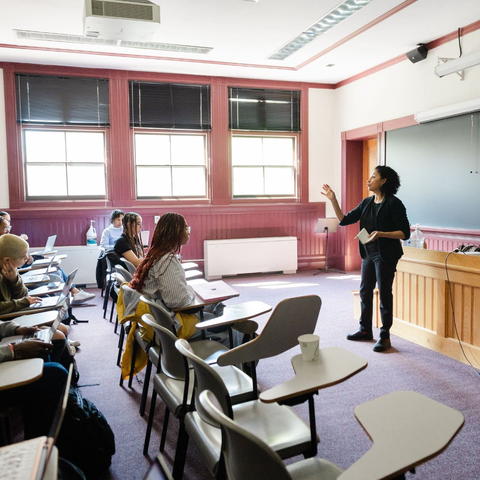 Professor teaching students in a classroom