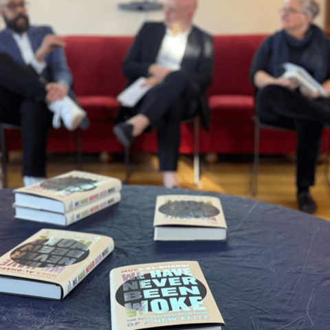 A set of books on a table.