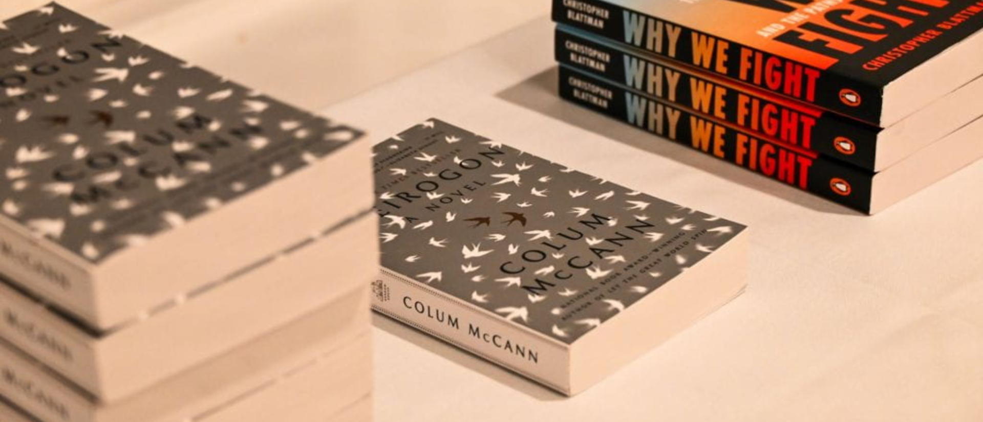 Stacks of two different books.