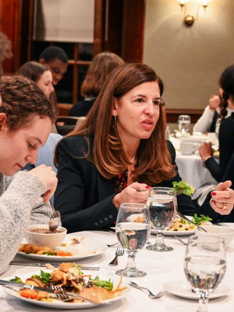 Professor Melani Cammett chats with Harvard College student event participants.