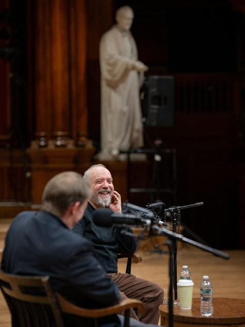 Giamatti and Asma enjoying their conversation during the podcast taping.