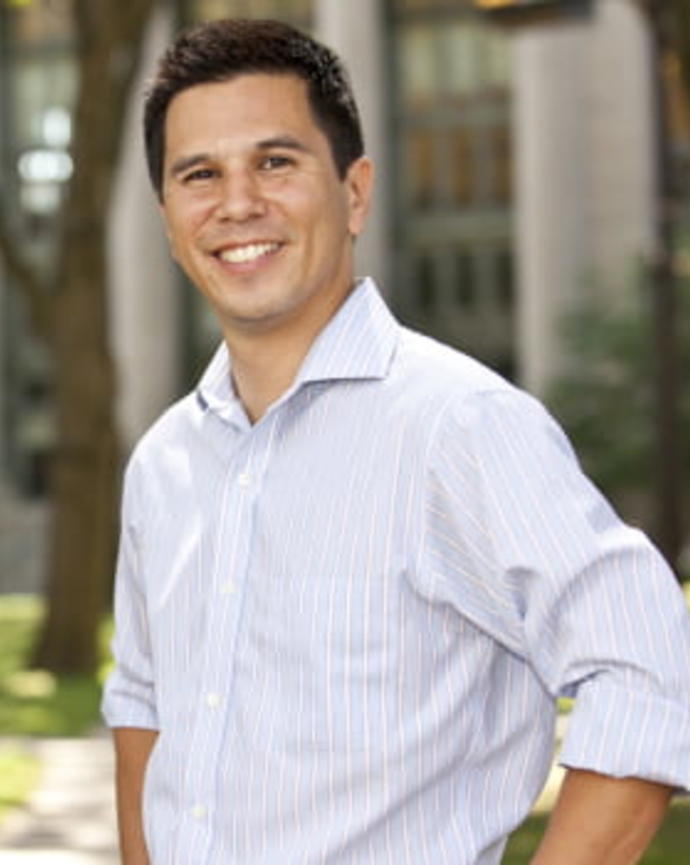 Stephen Chong in front of background.